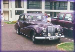 Bill B and Judy F admire an Armstrong Sidley.