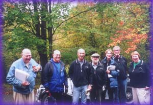 Friends pose in front of Morgan. Ed, Steve, Phillip, Marv, Sue K, Emile, Linda. (photo E. Fisher)